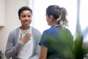 Women talking to Nurse